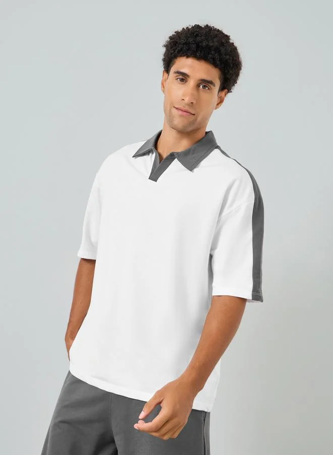 ستايلي طقم منسق من تيشيرت بولو واسع وشورت للرجال